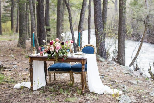 Vintage event rentals furniture at an outdoor wedding